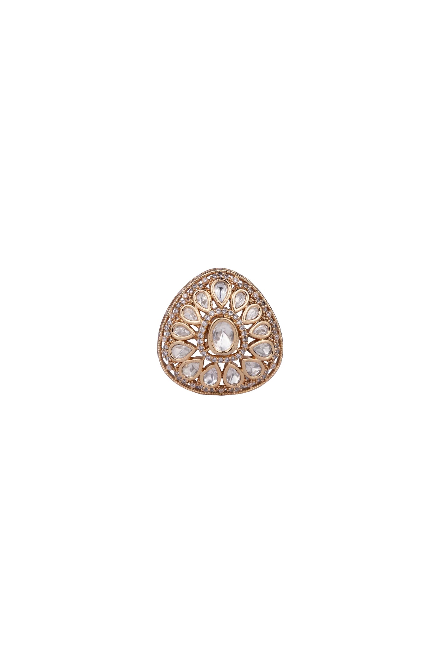Luxury detail of a hand adorned with an oversized gemstone ring featuring concentric layers of sparkling stones in a refined setting.