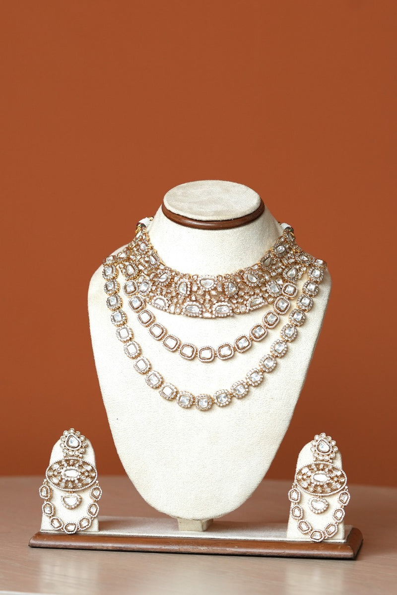 ARUNA BIG SMALL MIX POLKI UNEVEN CHOKER AND TWO LINE SET WITH MAANGTIKKA AND EARRINGS