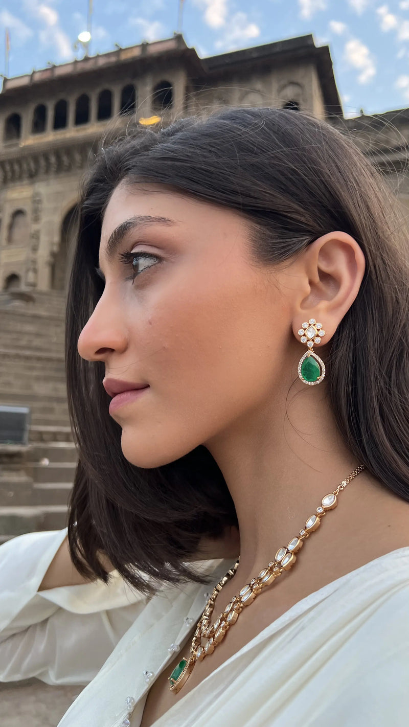 NIYATI DOUBLE LINE POLKI AND FAUX GREEN STONE LONG EARRINGS