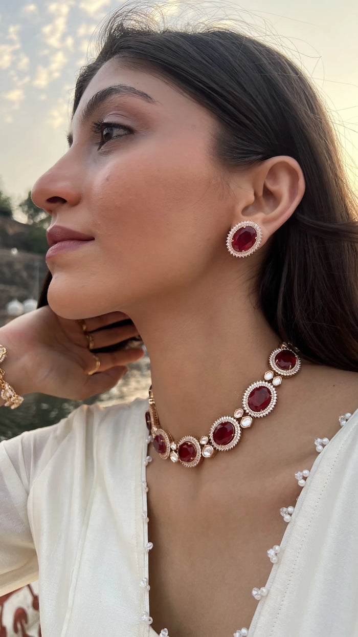 ruby stone jadau style necklace and earrings