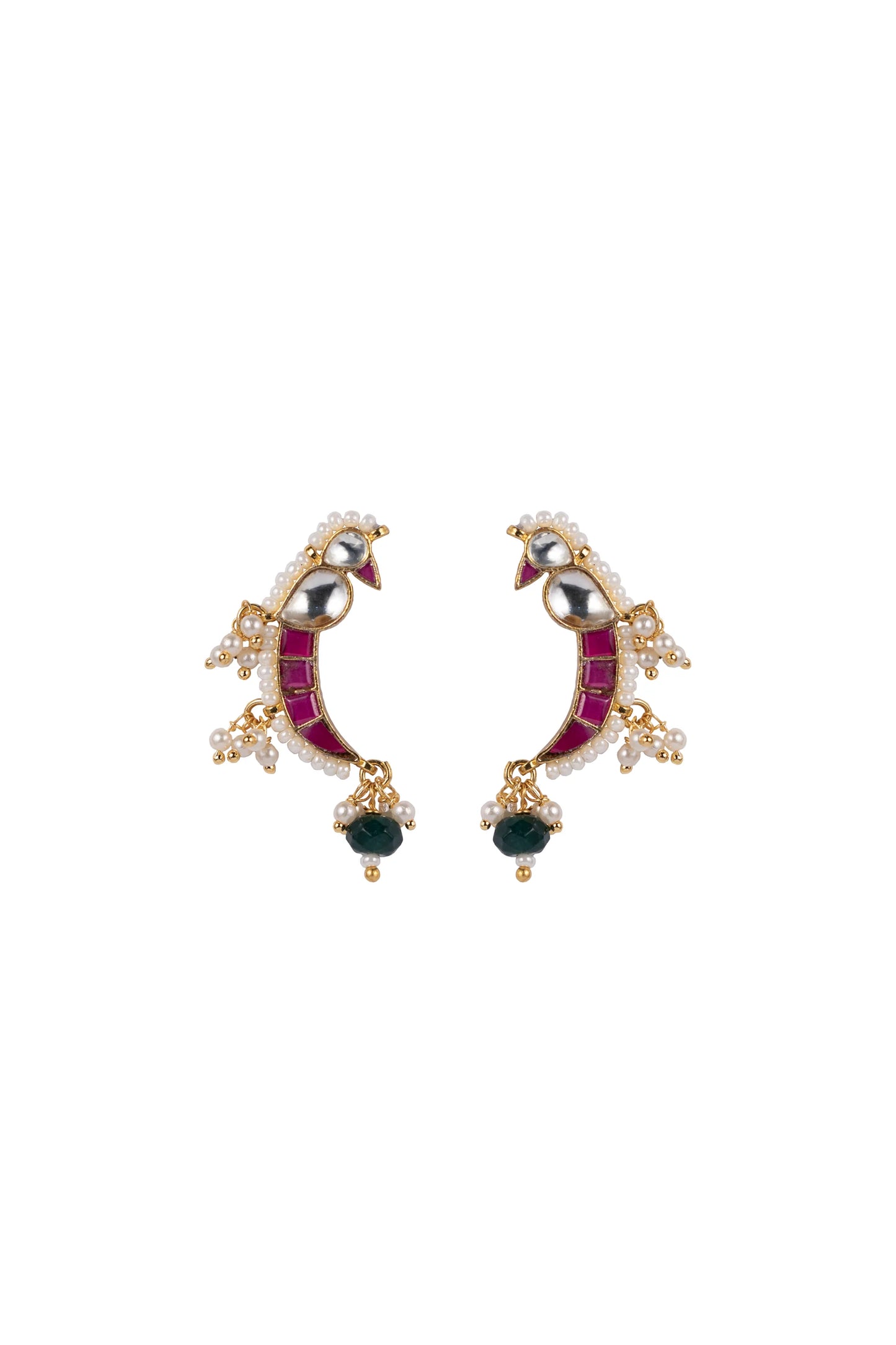 Fine jewelry detail of a handcrafted crescent ring featuring bright gemstone accents and intricate pearl work, worn on a softly lit hand.
