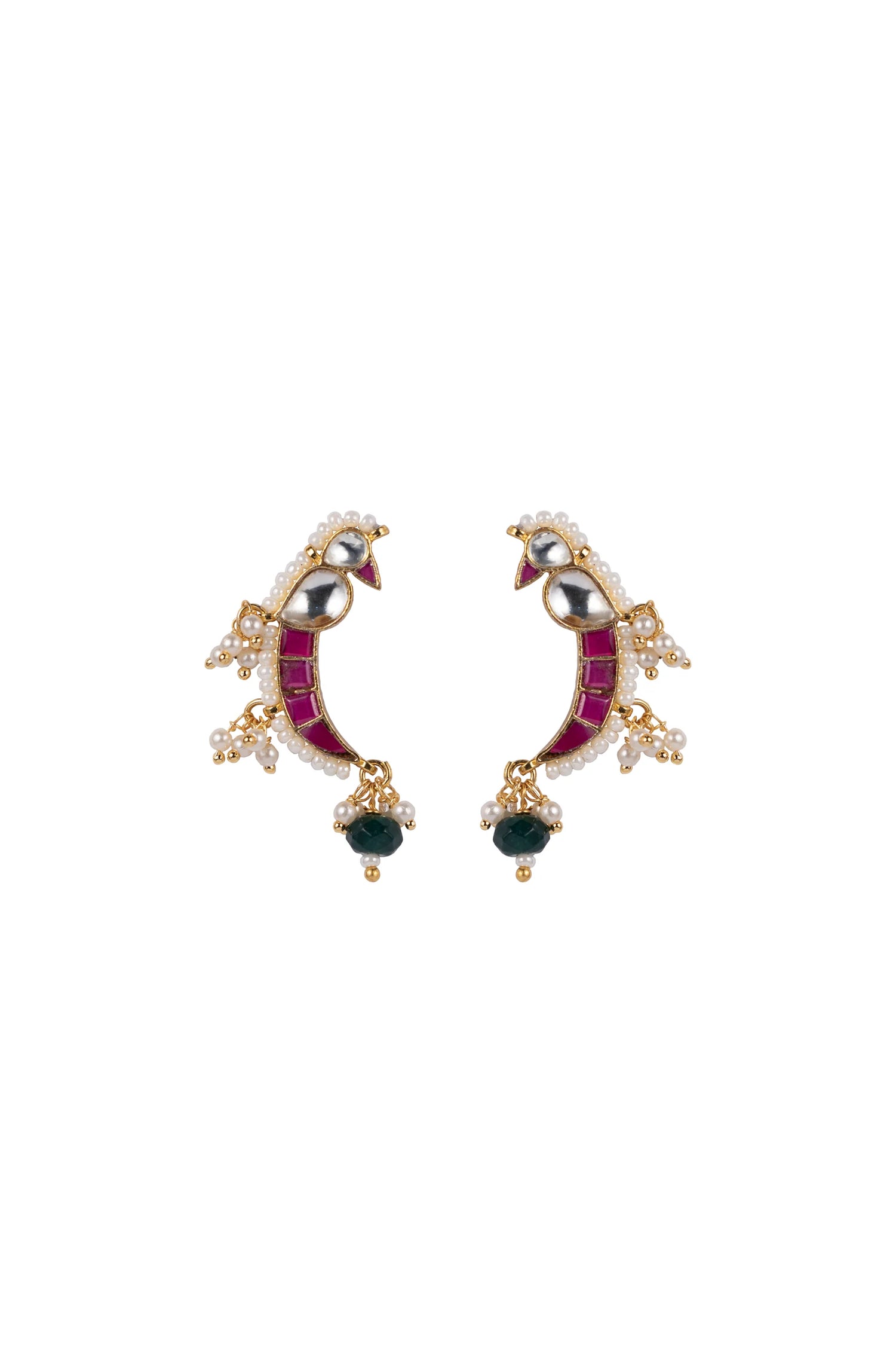 Fine jewelry detail of a handcrafted crescent ring featuring bright gemstone accents and intricate pearl work, worn on a softly lit hand.
