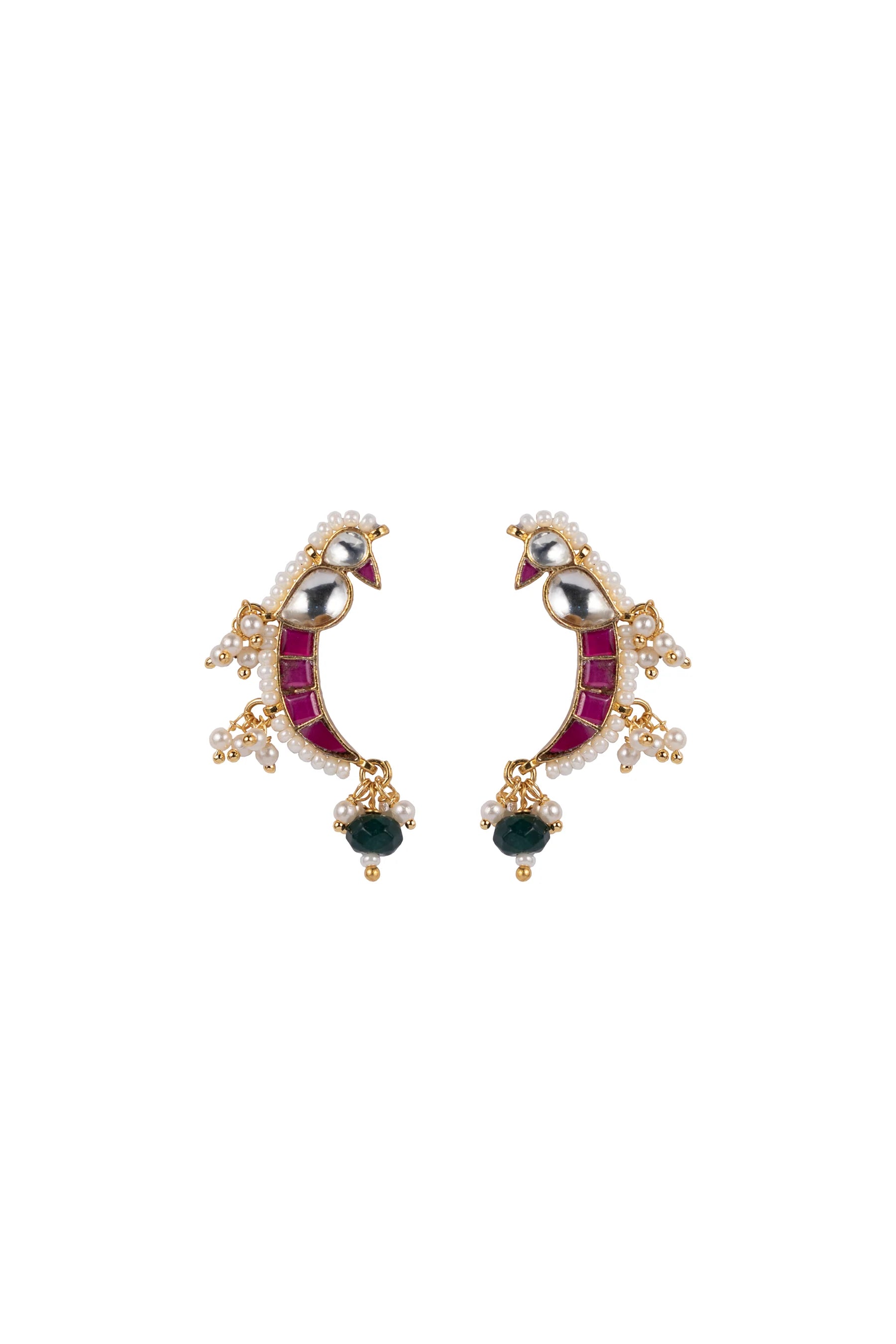 Fine jewelry detail of a handcrafted crescent ring featuring bright gemstone accents and intricate pearl work, worn on a softly lit hand.
