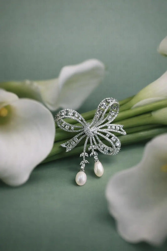 The Pearl Cascade Bow Taramati Brooch