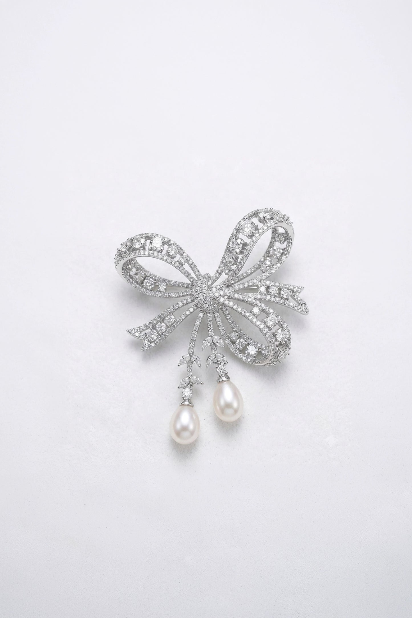 The Pearl Cascade Bow Taramati Brooch