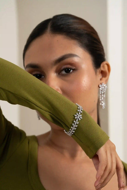 Luxury floral diamond bracelet with daisy-shaped clusters, handcrafted demi-fine jewellery