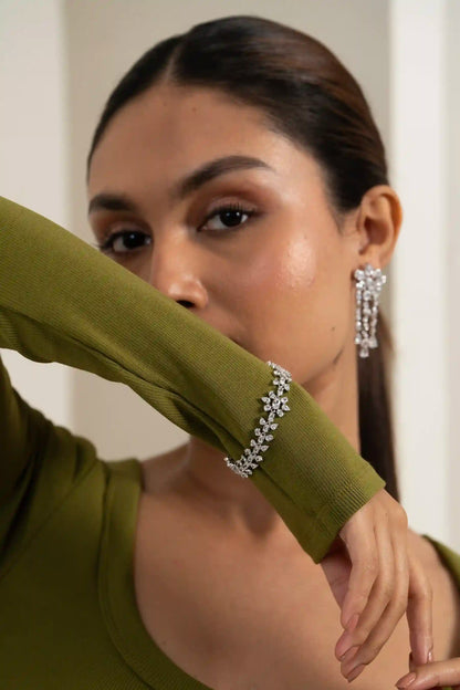 Elegant Cygnet diamond bracelet featuring daisy clusters, modern feminine jewellery piece