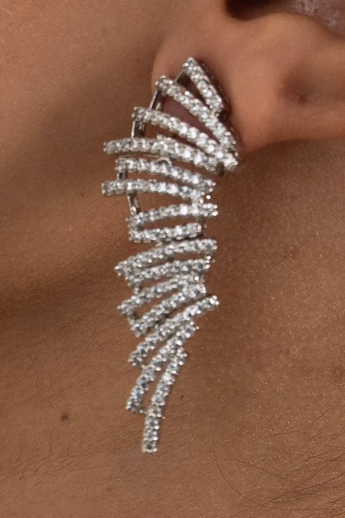 Handcrafted diamond feather ear sweep earring with cascading Cygnet diamonds, elegant statement jewellery by Tiramisu