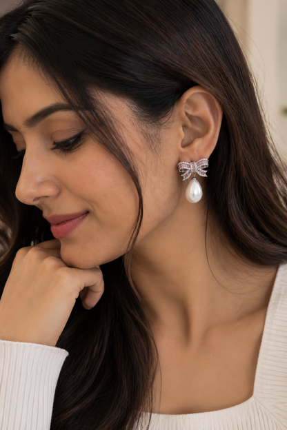 Blush Bow Pearl Drop Earrings